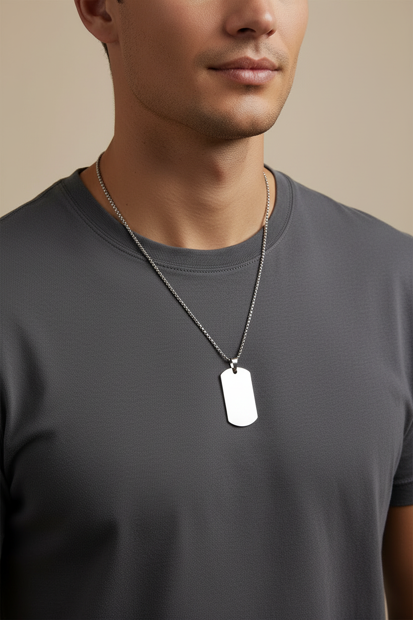 A stainless steel military dog tag and chain  